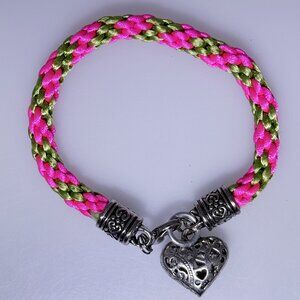 bright colored bracelet, fuchsia and green woven nylon with fancy silver tone